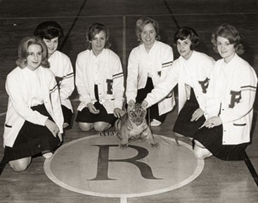 A Women's sport team posing for a picture with the cub